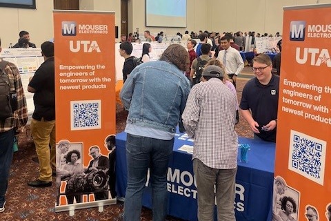 People talking at the Mouser Electronics booth on Innovation Day 2024 - opens in a new tab